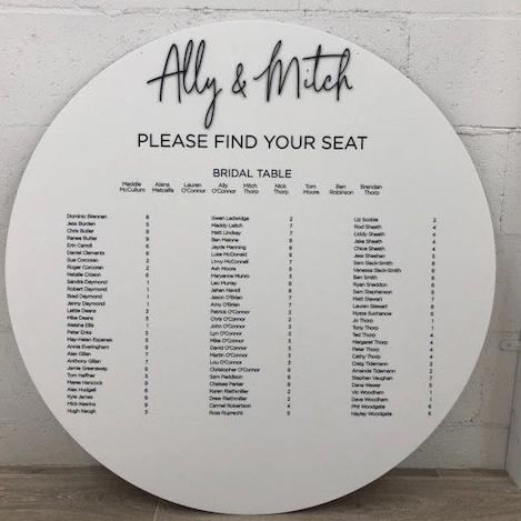 Custom printed round seating chart with 3D heading