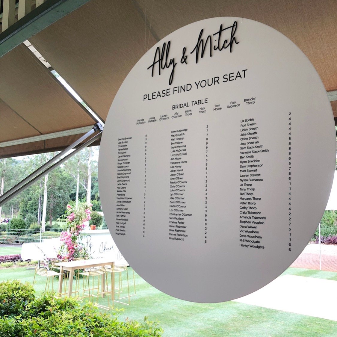 Custom printed round seating chart with 3D heading